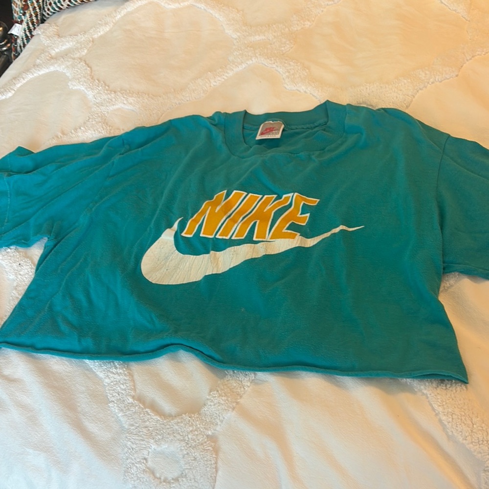 Vintage Nike Teal Crop T-Shirt with White Swoosh and Yellow Logo